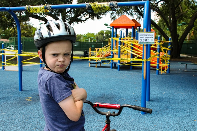 angry child on bicycle